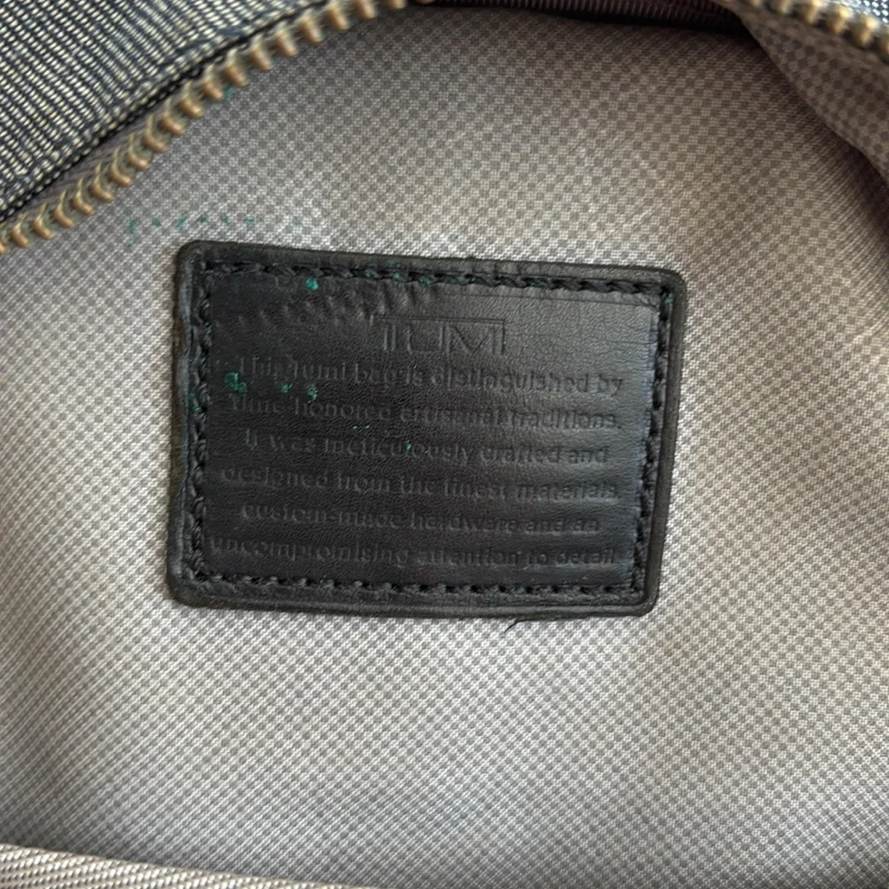 Tumi one strap demin backpack